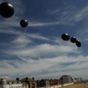 Art installation black balloons Brighton Pavilion