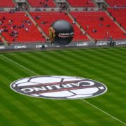 Giant inflatable Manchester United sphere at Carling Cup above football ground