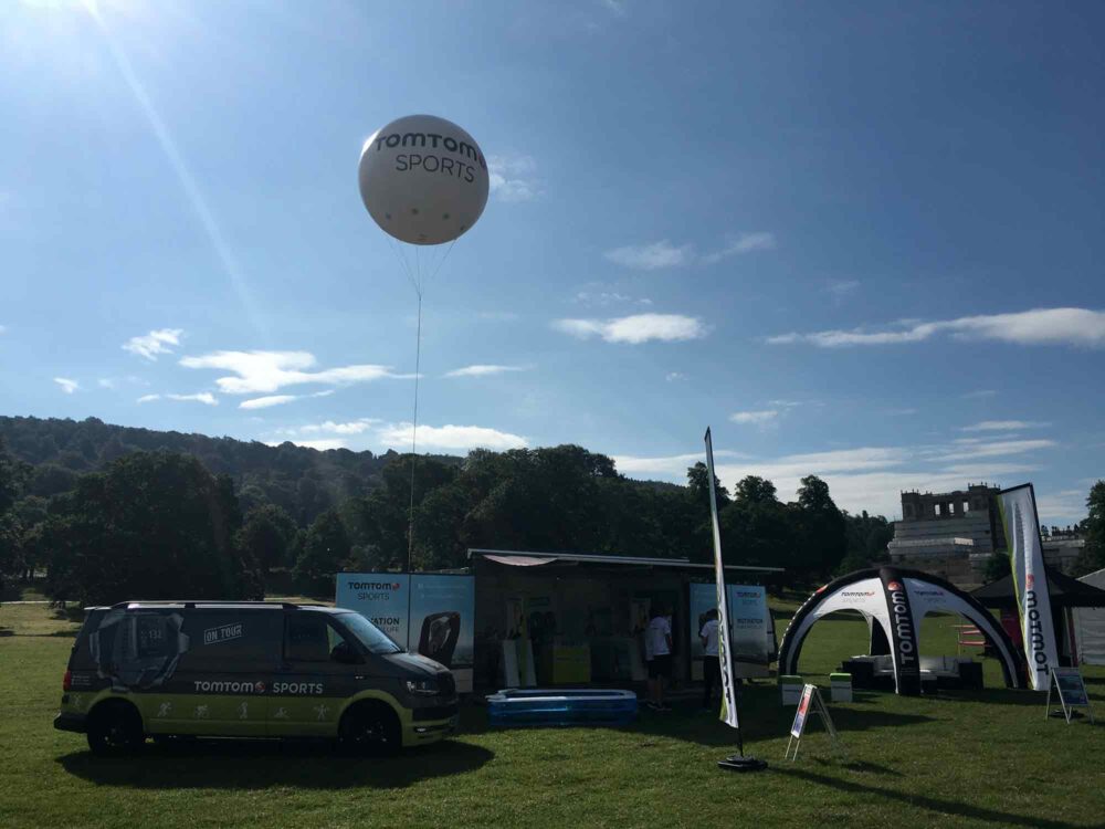 TomTom helium filled inflatable sphere in a festival field
