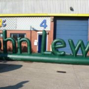 Inflatable letters spelling John Lewis