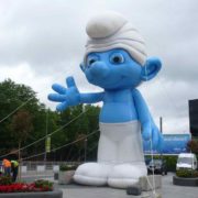 Inflatable Smurf tethered to the ground