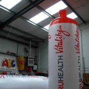 2 giant inflatable replica water bottles branded PruHealth