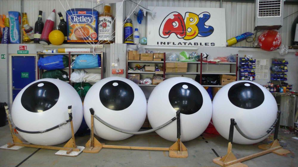 4 black and white large pushballs in ABC Inflatables' workshop