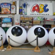 4 black and white large pushballs in ABC Inflatables' workshop