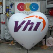 Giant white Vhi inflatable heart with branding