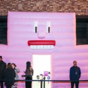 Ice Mountain inflatable pink wall with face