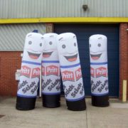 4 inflatable Pritt stick replicas outside ABC Inflatables' workshop