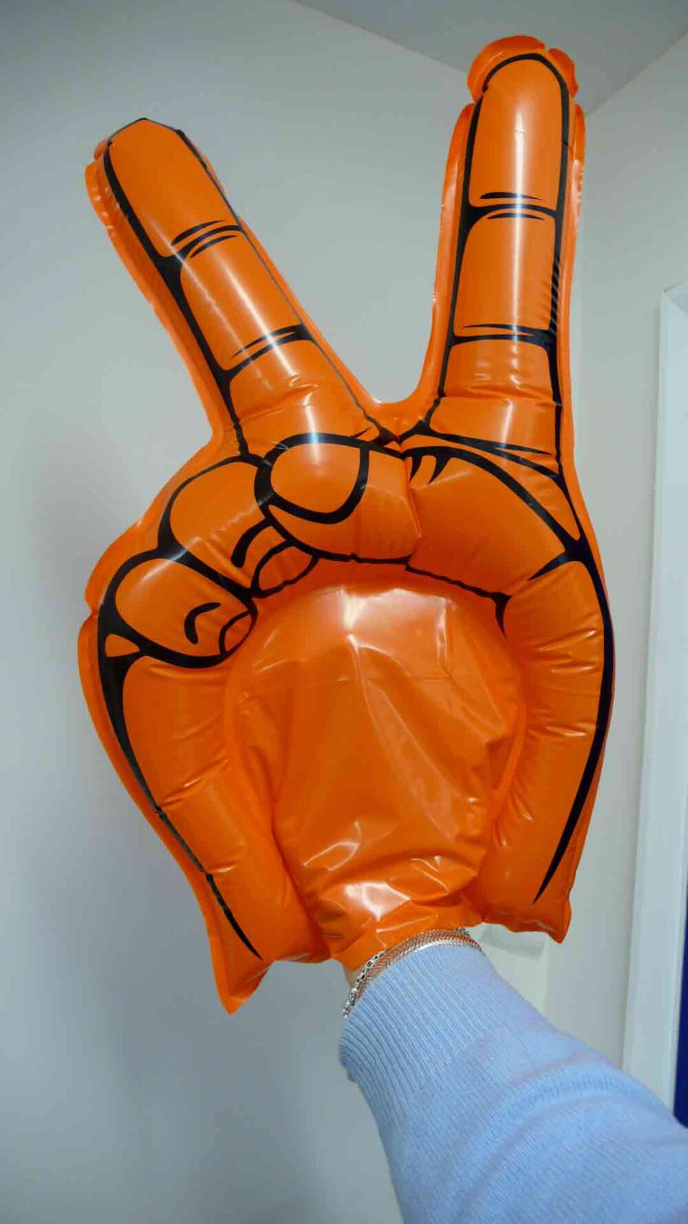 Orange inflatable victory salute hand