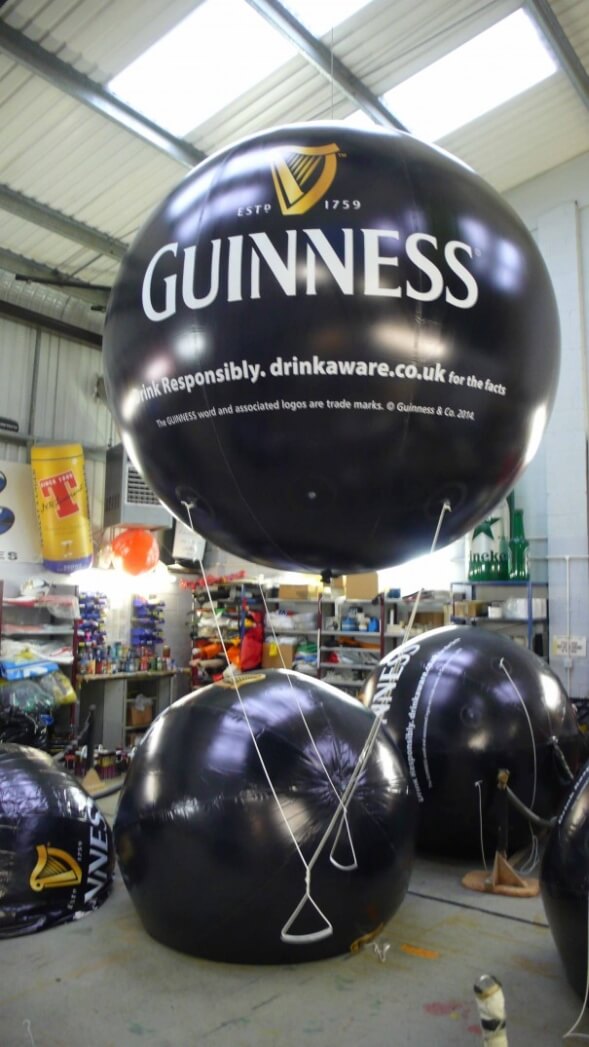 Inflatable Guinness Balls for Rugby Matches by ABC Inflatables