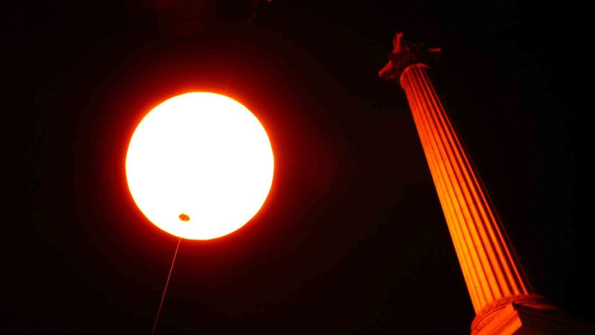 Tropicana giant inflatable sun by Nelson's Column
