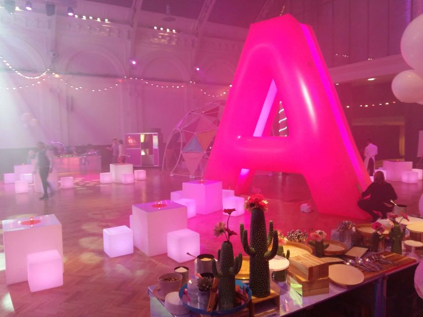 inflatable letter A illuminated at party