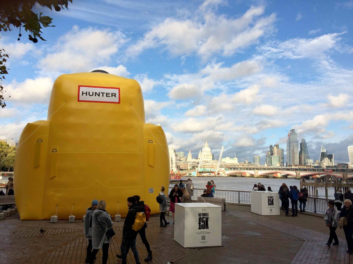 Giant inflatable backpack with people, London