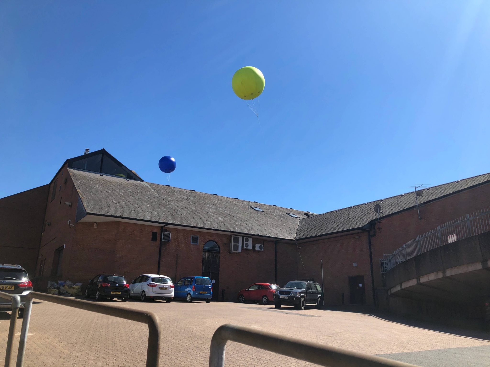 harlequins blue and green balloons